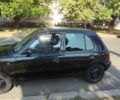 Чорний Ніссан Мікра, об'ємом двигуна 1 л та пробігом 170 тис. км за 2800 $, фото 1 на Automoto.ua