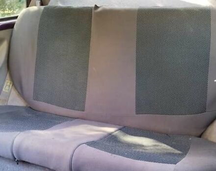 Фиолетовый Ниссан Микра, объемом двигателя 1 л и пробегом 277 тыс. км за 1700 $, фото 2 на Automoto.ua