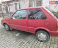 Червоний Ніссан Мікра, об'ємом двигуна 1 л та пробігом 432 тис. км за 1300 $, фото 1 на Automoto.ua