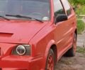Красный Ниссан Микра, объемом двигателя 2 л и пробегом 150 тыс. км за 1350 $, фото 1 на Automoto.ua