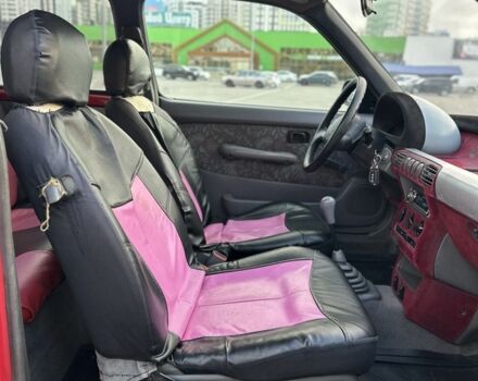 Червоний Ніссан Мікра, об'ємом двигуна 1 л та пробігом 230 тис. км за 1499 $, фото 13 на Automoto.ua