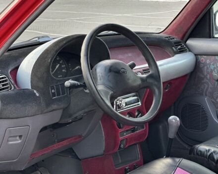 Червоний Ніссан Мікра, об'ємом двигуна 1 л та пробігом 230 тис. км за 1499 $, фото 9 на Automoto.ua
