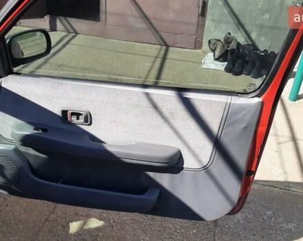 Червоний Ніссан Мікра, об'ємом двигуна 1 л та пробігом 270 тис. км за 1850 $, фото 9 на Automoto.ua