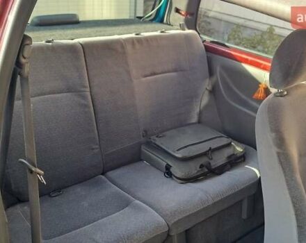 Красный Ниссан Микра, объемом двигателя 1 л и пробегом 300 тыс. км за 1700 $, фото 6 на Automoto.ua