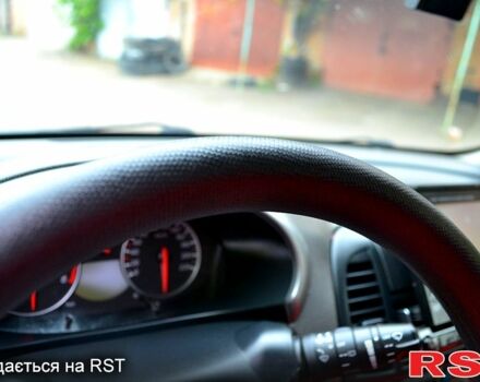 Червоний Ніссан Мікра, об'ємом двигуна 1.2 л та пробігом 137 тис. км за 5650 $, фото 7 на Automoto.ua