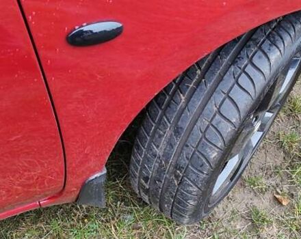 Красный Ниссан Микра, объемом двигателя 1.2 л и пробегом 49 тыс. км за 9400 $, фото 3 на Automoto.ua