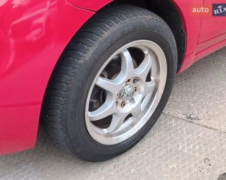 Красный Ниссан Микра, объемом двигателя 1.6 л и пробегом 50 тыс. км за 8290 $, фото 3 на Automoto.ua