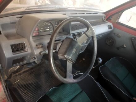 Красный Ниссан Микра, объемом двигателя 1 л и пробегом 2 тыс. км за 815 $, фото 1 на Automoto.ua