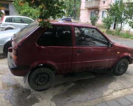 Червоний Ніссан Мікра, об'ємом двигуна 1 л та пробігом 450 тис. км за 800 $, фото 1 на Automoto.ua
