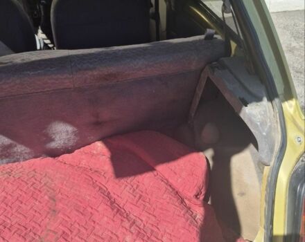 Желтый Ниссан Микра, объемом двигателя 1 л и пробегом 242 тыс. км за 699 $, фото 11 на Automoto.ua