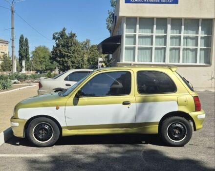 Желтый Ниссан Микра, объемом двигателя 1 л и пробегом 242 тыс. км за 699 $, фото 1 на Automoto.ua