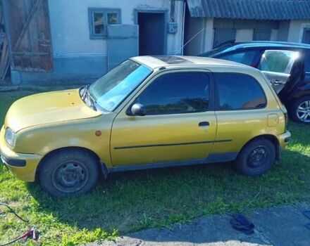Желтый Ниссан Микра, объемом двигателя 1 л и пробегом 372 тыс. км за 1500 $, фото 2 на Automoto.ua