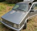 Серый Ниссан Микра, объемом двигателя 1 л и пробегом 260 тыс. км за 656 $, фото 1 на Automoto.ua