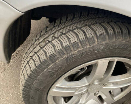 Серый Ниссан Микра, объемом двигателя 1 л и пробегом 233 тыс. км за 2550 $, фото 1 на Automoto.ua