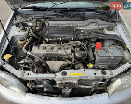 Серый Ниссан Микра, объемом двигателя 1 л и пробегом 229 тыс. км за 3100 $, фото 12 на Automoto.ua