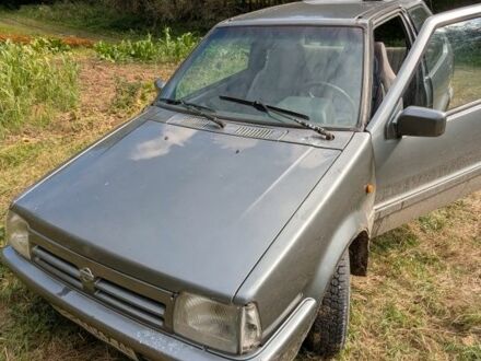 Серый Ниссан Микра, объемом двигателя 1 л и пробегом 260 тыс. км за 656 $, фото 1 на Automoto.ua