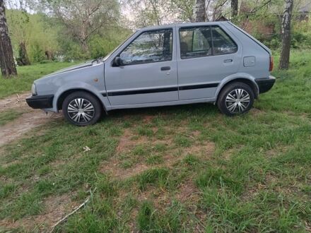 Ніссан Мікра 1991 у Лубнах на Automoto.ua Сірий Ніссан Мікра, об'ємом двигуна 1 л та пробігом 150 тис. км за 850 $, фото 1 на Automoto.ua