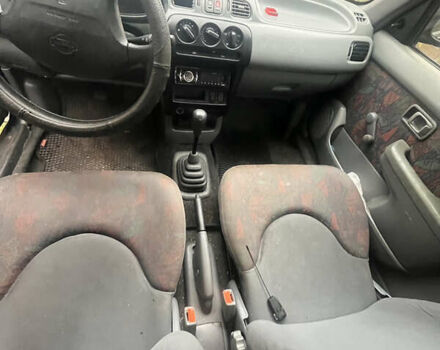 Синий Ниссан Микра, объемом двигателя 1 л и пробегом 150 тыс. км за 1500 $, фото 5 на Automoto.ua