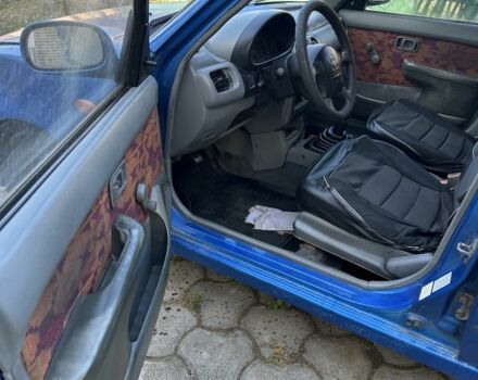 Синий Ниссан Микра, объемом двигателя 1 л и пробегом 200 тыс. км за 900 $, фото 5 на Automoto.ua