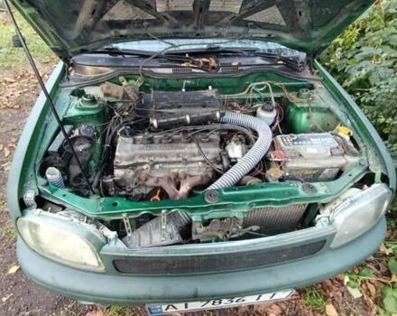 Зеленый Ниссан Микра, объемом двигателя 1 л и пробегом 77 тыс. км за 1500 $, фото 4 на Automoto.ua