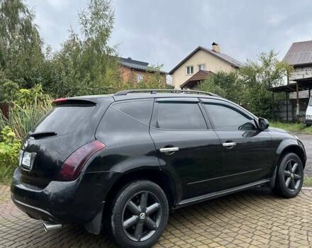 Черный Ниссан Мурано, объемом двигателя 3.5 л и пробегом 208 тыс. км за 4600 $, фото 5 на Automoto.ua