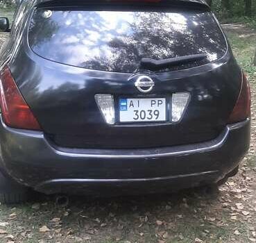 Черный Ниссан Мурано, объемом двигателя 3.5 л и пробегом 250 тыс. км за 5600 $, фото 4 на Automoto.ua