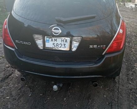 Черный Ниссан Мурано, объемом двигателя 3.5 л и пробегом 301 тыс. км за 4500 $, фото 2 на Automoto.ua