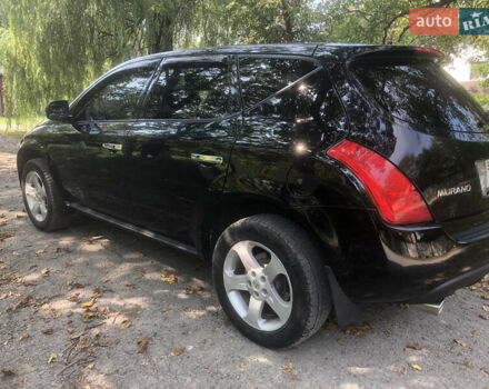 Черный Ниссан Мурано, объемом двигателя 3.5 л и пробегом 350 тыс. км за 5900 $, фото 5 на Automoto.ua