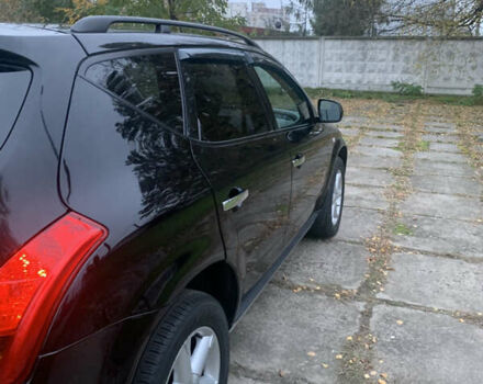 Черный Ниссан Мурано, объемом двигателя 3.5 л и пробегом 282 тыс. км за 7500 $, фото 3 на Automoto.ua