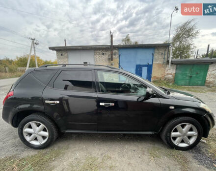 Черный Ниссан Мурано, объемом двигателя 3.5 л и пробегом 290 тыс. км за 6500 $, фото 5 на Automoto.ua