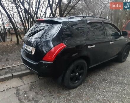 Черный Ниссан Мурано, объемом двигателя 3.5 л и пробегом 228 тыс. км за 6200 $, фото 2 на Automoto.ua