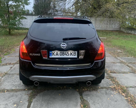 Черный Ниссан Мурано, объемом двигателя 3.5 л и пробегом 282 тыс. км за 7500 $, фото 1 на Automoto.ua
