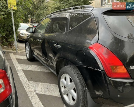 Черный Ниссан Мурано, объемом двигателя 3.5 л и пробегом 201 тыс. км за 4000 $, фото 4 на Automoto.ua