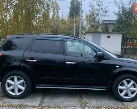 Черный Ниссан Мурано, объемом двигателя 3.5 л и пробегом 282 тыс. км за 7500 $, фото 4 на Automoto.ua
