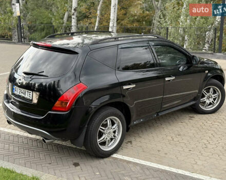 Черный Ниссан Мурано, объемом двигателя 3.5 л и пробегом 238 тыс. км за 6500 $, фото 24 на Automoto.ua