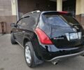 Черный Ниссан Мурано, объемом двигателя 3.5 л и пробегом 185 тыс. км за 5800 $, фото 1 на Automoto.ua