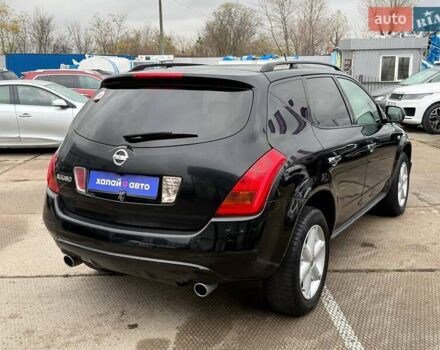 Черный Ниссан Мурано, объемом двигателя 3.5 л и пробегом 260 тыс. км за 7000 $, фото 4 на Automoto.ua