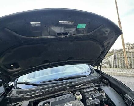 Черный Ниссан Мурано, объемом двигателя 2.49 л и пробегом 202 тыс. км за 13000 $, фото 48 на Automoto.ua