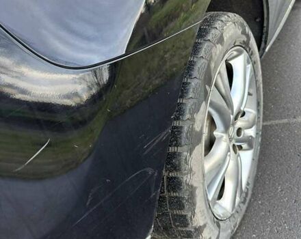 Черный Ниссан Мурано, объемом двигателя 2.49 л и пробегом 202 тыс. км за 13000 $, фото 11 на Automoto.ua