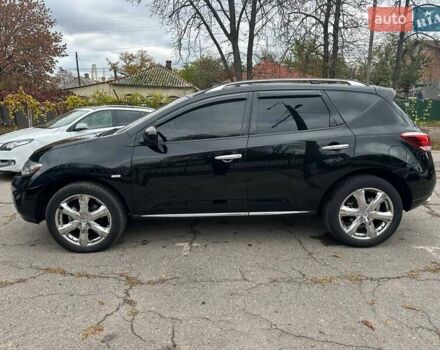 Черный Ниссан Мурано, объемом двигателя 4.25 л и пробегом 192 тыс. км за 11500 $, фото 1 на Automoto.ua