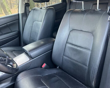 Черный Ниссан Мурано, объемом двигателя 2.49 л и пробегом 218 тыс. км за 16300 $, фото 31 на Automoto.ua