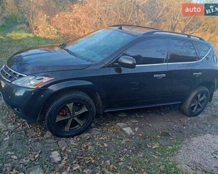 Черный Ниссан Мурано, объемом двигателя 3.5 л и пробегом 301 тыс. км за 4500 $, фото 1 на Automoto.ua