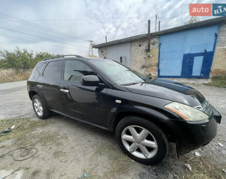 Черный Ниссан Мурано, объемом двигателя 3.5 л и пробегом 290 тыс. км за 6500 $, фото 1 на Automoto.ua