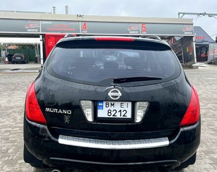 Черный Ниссан Мурано, объемом двигателя 3.5 л и пробегом 250 тыс. км за 5700 $, фото 1 на Automoto.ua