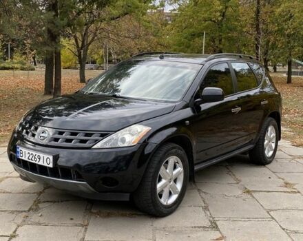 Черный Ниссан Мурано, объемом двигателя 3.5 л и пробегом 259 тыс. км за 4700 $, фото 1 на Automoto.ua