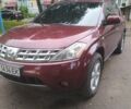 Красный Ниссан Мурано, объемом двигателя 3.5 л и пробегом 380 тыс. км за 7000 $, фото 1 на Automoto.ua