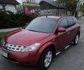 Красный Ниссан Мурано, объемом двигателя 3.5 л и пробегом 250 тыс. км за 5600 $, фото 1 на Automoto.ua