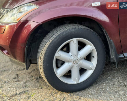 Красный Ниссан Мурано, объемом двигателя 3.5 л и пробегом 235 тыс. км за 5500 $, фото 2 на Automoto.ua