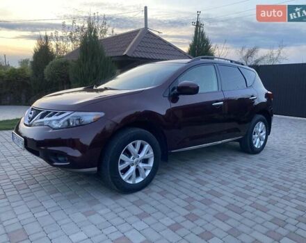Красный Ниссан Мурано, объемом двигателя 3.5 л и пробегом 229 тыс. км за 10999 $, фото 1 на Automoto.ua