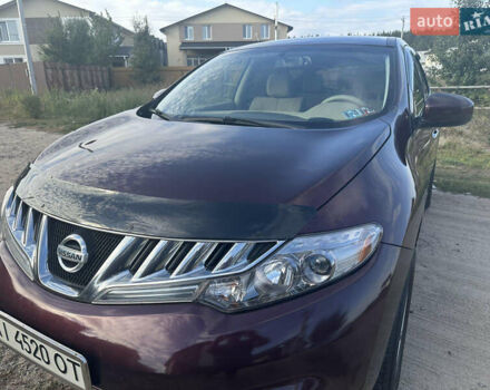 Красный Ниссан Мурано, объемом двигателя 3.5 л и пробегом 129 тыс. км за 9900 $, фото 1 на Automoto.ua